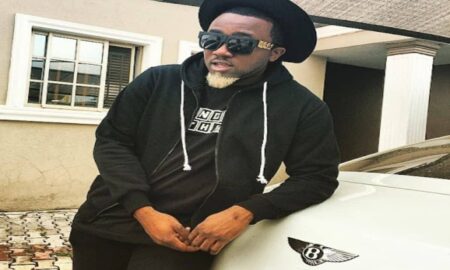 Ice prince posing with his Benz