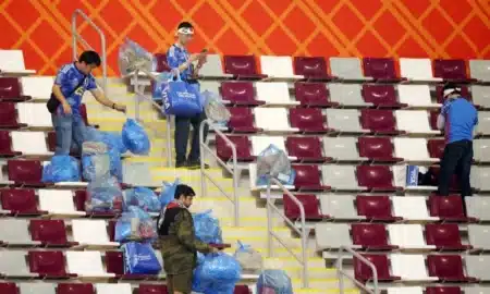 Japanese supporters tidy up stadium
