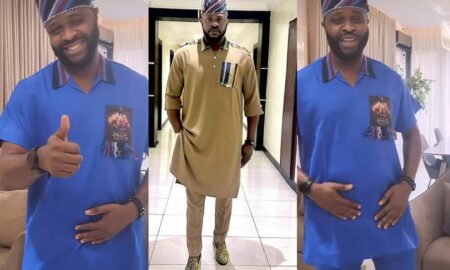 Odunlade Adekola gifts Femi Adebayo a branded T-shirt