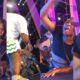 Davido consoles emotional fan in his Uganda show.