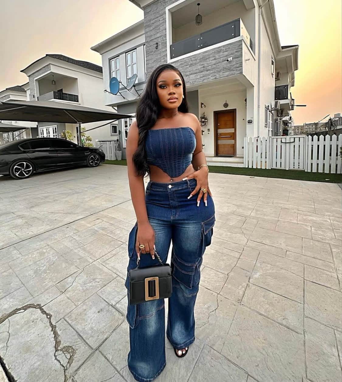 Ceec in a denim outfit.